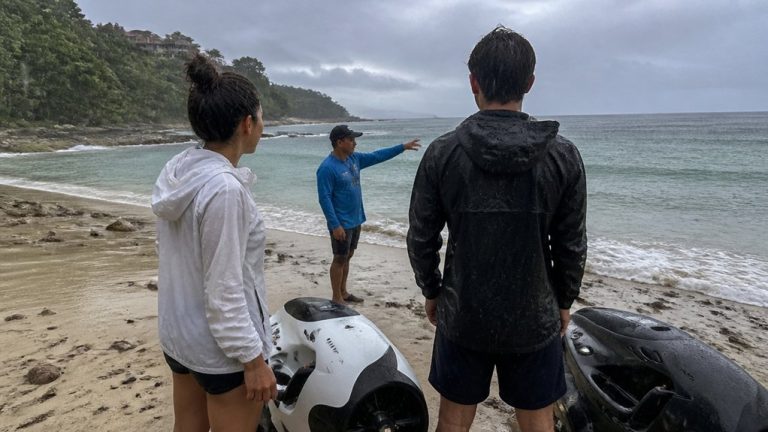 rain soaked sea scooter tour